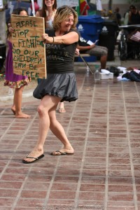 Melissa Baling with sign "Stop fighting so our children can be free." Balin claims the City of Los Angeles and police resulted in the "miscarriage of her first pregnancy." Melissa Baling with sign "Stop fighting so our children can be free." Balin claims Los Angeles and police actions resulted in the "miscarriage of her first pregnancy."